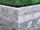 Mauersteine Gneis Urban Grey Line mit Gras