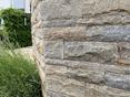 Mauersteine Kalkstein Frnkischer Muschelkalk mit Gras