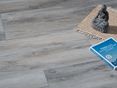 Platten in Holzoptik Canada Lake mit Buddha und Yoga-Buch